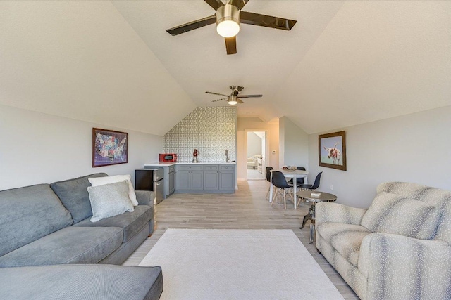 14415 Echo Blf, Austin, TX 78737 - living area with a ceiling fan, vaulted ceiling, and light wood-type flooring