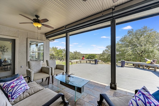 14415 Echo Blf, Austin, TX 78737 - sunroom featuring a ceiling fan and an outdoor living space