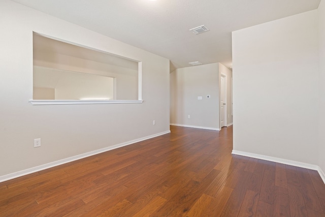 5825 Roderick Dr, Austin, TX 78724 - empty room featuring wood finished floors and baseboards