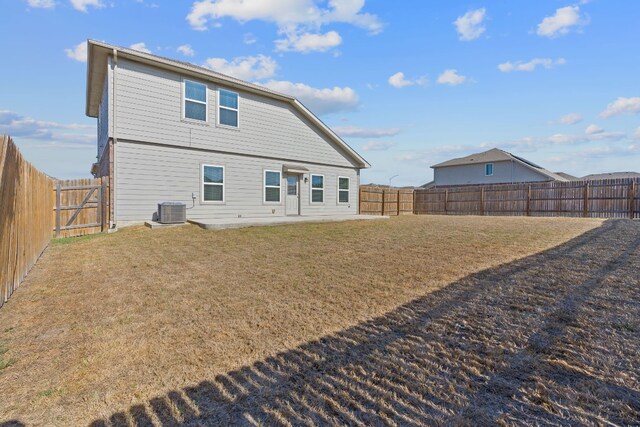 5825 Roderick Dr, Austin, TX 78724 - rear view of house with central AC unit