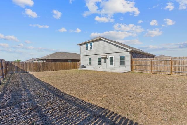 5825 Roderick Dr, Austin, TX 78724 - back of house featuring a patio