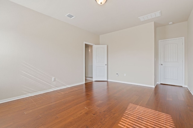 5825 Roderick Dr, Austin, TX 78724 - empty room with wood finished floors and baseboards