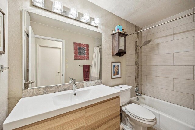 2402 Stevens Cv, Austin, TX 78723 - bathroom featuring vanity and shower / bath combo with shower curtain