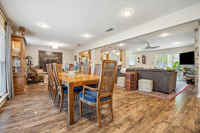 2402 Stevens Cv, Austin, TX 78723 - dining space featuring wood finished floors, recessed lighting, and a ceiling fan