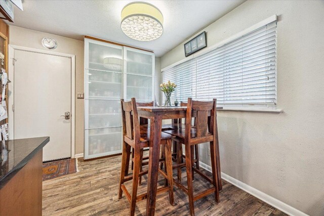 2402 Stevens Cv, Austin, TX 78723 - dining space with wood finished floors