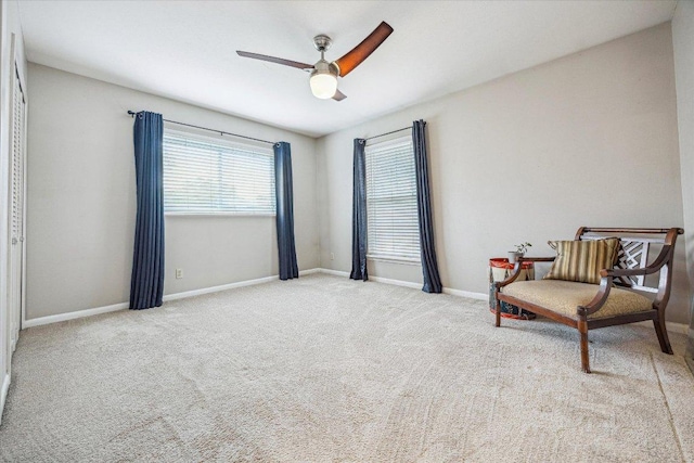2402 Stevens Cv, Austin, TX 78723 - sitting room with ceiling fan, carpet floors, and baseboards