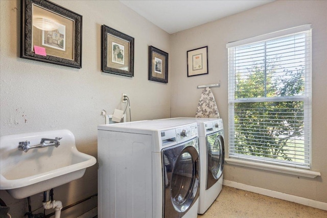 2402 Stevens Cv, Austin, TX 78723 - laundry area with independent washer and dryer and plenty of natural light