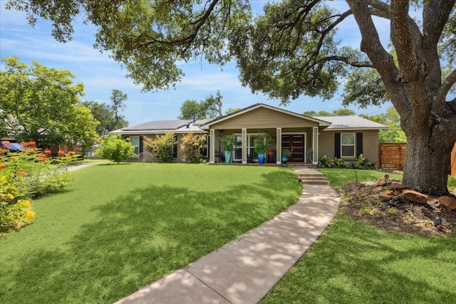 2402 Stevens Cv, Austin, TX 78723 - ranch-style house with covered porch