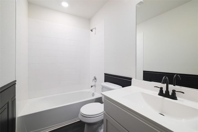 12024 Roving Pass, Elgin, TX 78621 - bathroom with toilet, vanity,  shower combination, wood finished floors, and recessed lighting