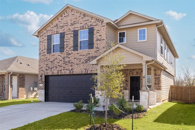 12024 Roving Pass, Elgin, TX 78621 - view of front of property featuring concrete driveway, a garage, brick siding, and stone siding