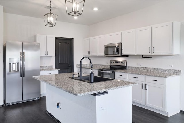 12024 Roving Pass, Elgin, TX 78621 - kitchen featuring stainless steel appliances, a sink, dark wood-style flooring, white cabinets, and recessed lighting