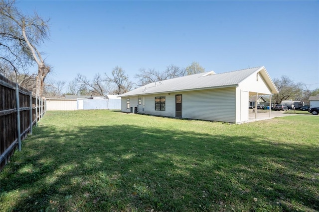 1510 Prather St, Taylor, TX 76574 - back of property with fence private yard, a yard, and metal roof