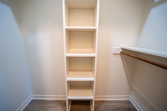 1510 Prather St, Taylor, TX 76574 - walk in closet with wood finished floors