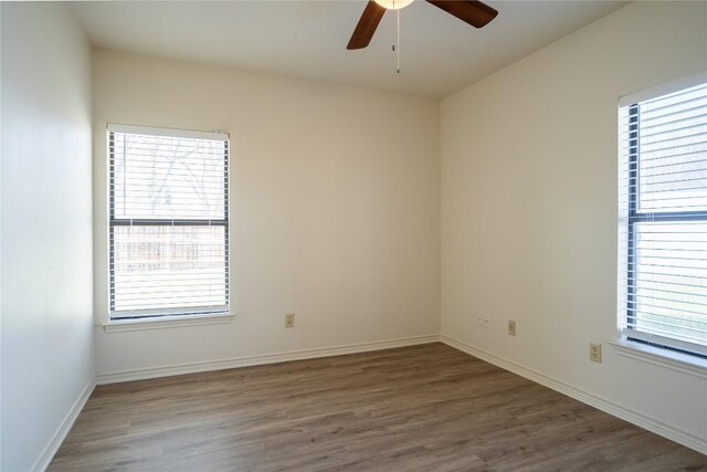 1510 Prather St, Taylor, TX 76574 - unfurnished room featuring baseboards, wood finished floors, and a ceiling fan