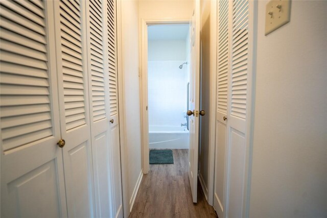 1510 Prather St, Taylor, TX 76574 - hall with dark wood finished floors and baseboards