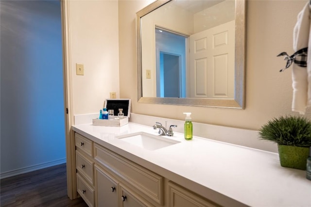 1510 Prather St, Taylor, TX 76574 - bathroom featuring wood finished floors and vanity