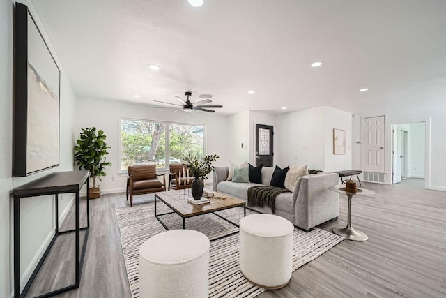 5510 Coventry Ln, Austin, TX 78723 - living area with light wood finished floors, recessed lighting, and a ceiling fan