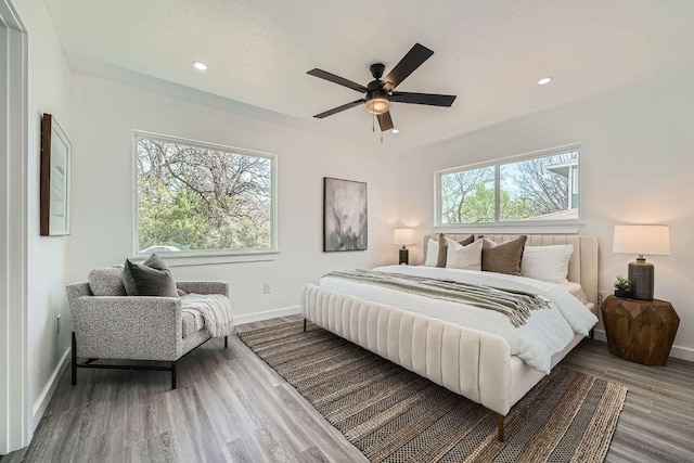 5510 Coventry Ln, Austin, TX 78723 - bedroom featuring wood finished floors, recessed lighting, and a ceiling fan