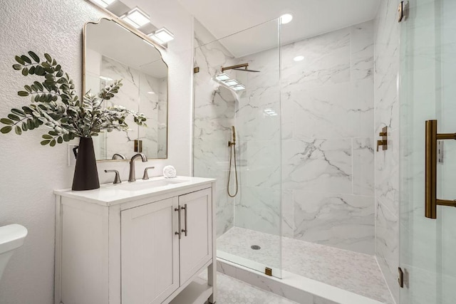 5510 Coventry Ln, Austin, TX 78723 - bathroom with a marble finish shower and vanity