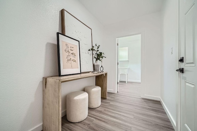 5510 Coventry Ln, Austin, TX 78723 - hallway with light wood-style flooring and baseboards