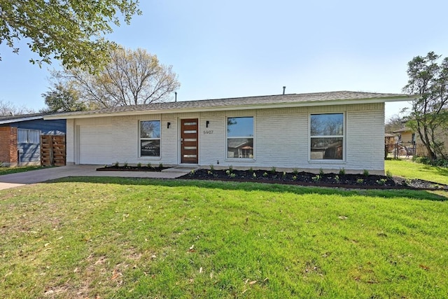 5907 Glenhollow Path, Austin, TX 78745 - ranch-style home featuring brick siding, concrete driveway, a garage, and a front lawn