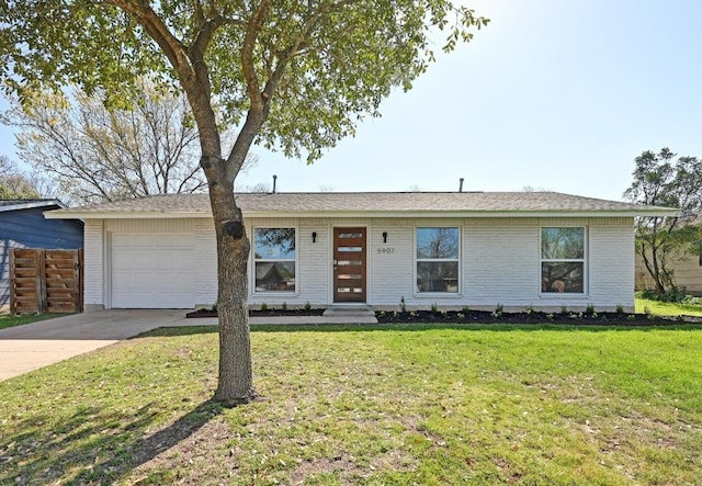 5907 Glenhollow Path, Austin, TX 78745 - ranch-style house featuring concrete driveway, an attached garage, and brick siding