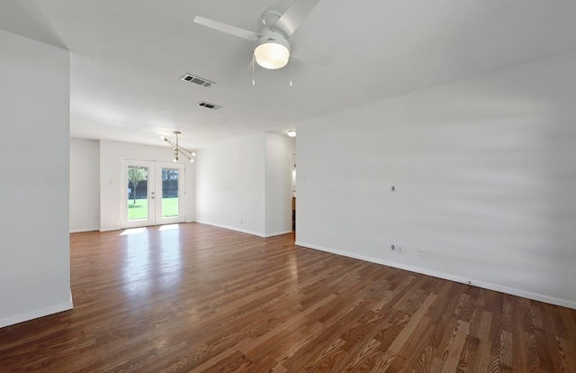 5907 Glenhollow Path, Austin, TX 78745 - unfurnished room featuring dark wood-style floors, baseboards, french doors, and ceiling fan