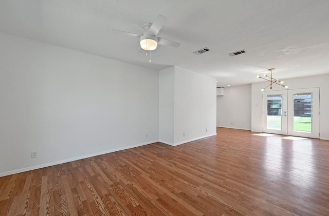 5907 Glenhollow Path, Austin, TX 78745 - empty room with wood finished floors and ceiling fan