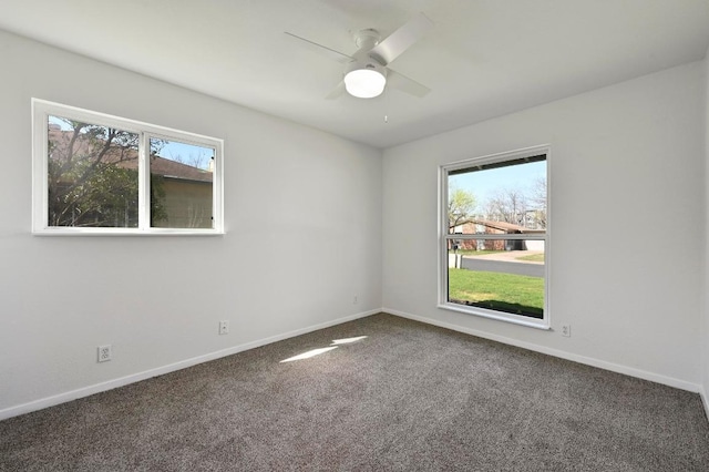 5907 Glenhollow Path, Austin, TX 78745 - carpeted spare room with plenty of natural light, a ceiling fan, and baseboards