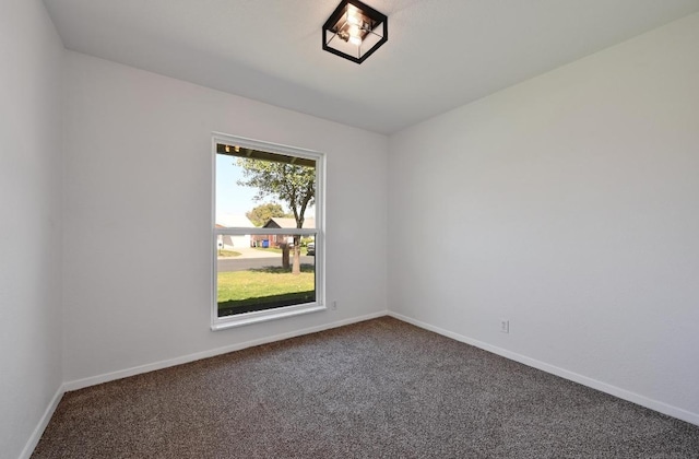 5907 Glenhollow Path, Austin, TX 78745 - empty room featuring carpet floors and baseboards