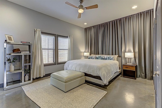2612 Hidalgo St, Austin, TX 78702 - bedroom featuring finished concrete floors, ceiling fan, and recessed lighting