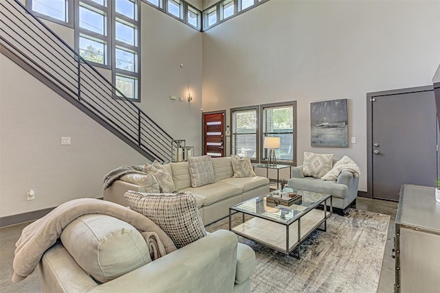 2612 Hidalgo St, Austin, TX 78702 - living room featuring a towering ceiling and stairway