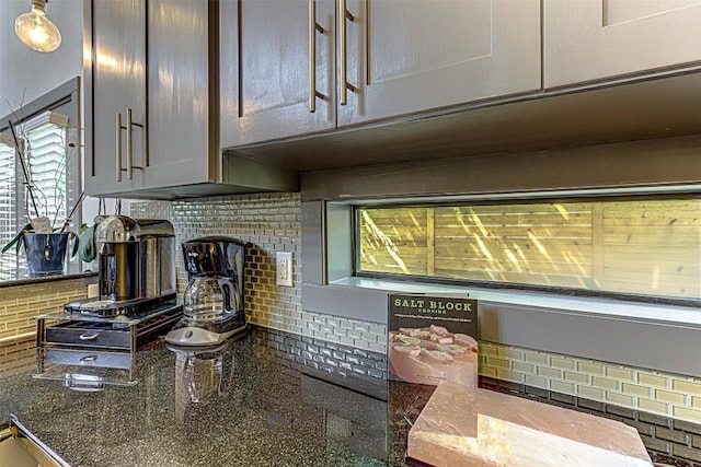 2612 Hidalgo St, Austin, TX 78702 - kitchen view of tasteful backsplash and gray cabinetry