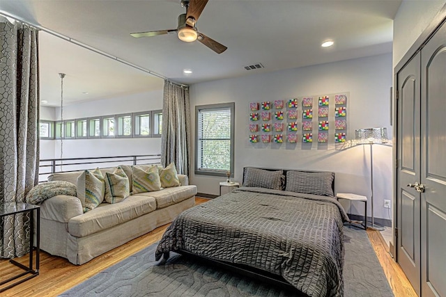 2612 Hidalgo St, Austin, TX 78702 - bedroom with light wood-style floors, recessed lighting, and a ceiling fan