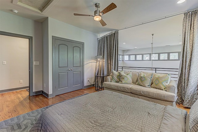2612 Hidalgo St, Austin, TX 78702 - bedroom featuring wood finished floors, ceiling fan, attic access, a closet, and recessed lighting