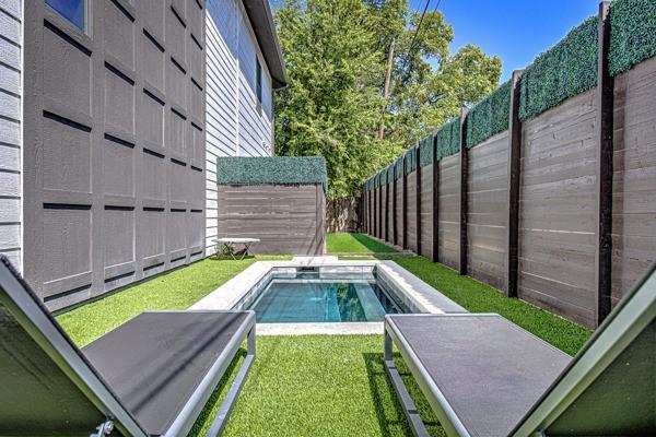 2612 Hidalgo St, Austin, TX 78702 - view of pool with a fenced backyard and a storage shed