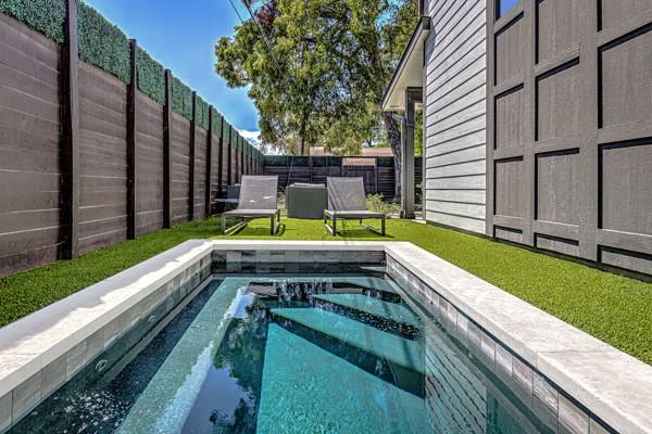 2612 Hidalgo St, Austin, TX 78702 - view of swimming pool featuring a fenced backyard