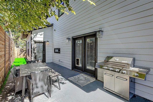 2612 Hidalgo St, Austin, TX 78702 - view of patio with outdoor dining area and grilling area