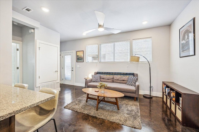 11393/4 Gunter St Unit B, Austin, TX 78721 - living room with concrete flooring, a ceiling fan, and recessed lighting