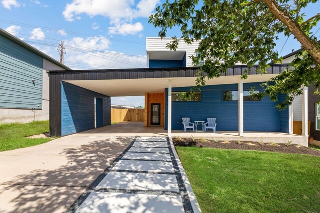 5809 Toscana Ave, Austin, TX 78724 - contemporary house with driveway and a carport