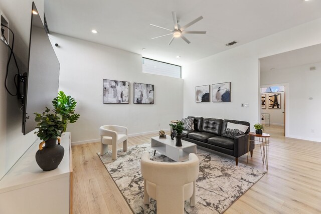 5809 Toscana Ave, Austin, TX 78724 - living room featuring ceiling fan, light wood finished floors, recessed lighting, and baseboards