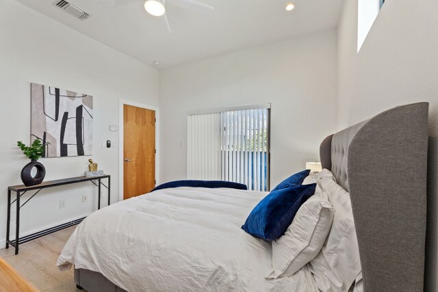 5809 Toscana Ave, Austin, TX 78724 - bedroom featuring wood finished floors, a ceiling fan, and recessed lighting