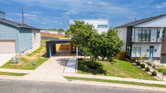 5809 Toscana Ave, Austin, TX 78724 - view of front of house with driveway and a carport