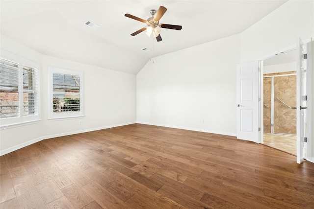 20700 Windmill Ridge St, Pflugerville, TX 78660 - additional living space with ceiling fan, wood finished floors, vaulted ceiling, and baseboards
