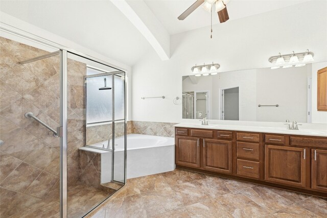 20700 Windmill Ridge St, Pflugerville, TX 78660 - bathroom with a shower stall, a garden tub, double vanity, ceiling fan, and vaulted ceiling