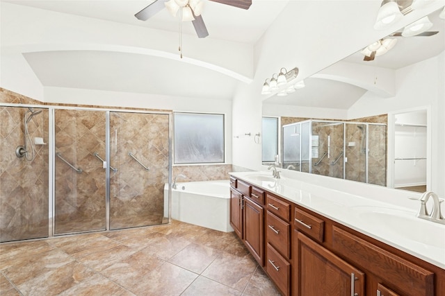 20700 Windmill Ridge St, Pflugerville, TX 78660 - full bathroom featuring ceiling fan, a shower stall, a bath, and double vanity