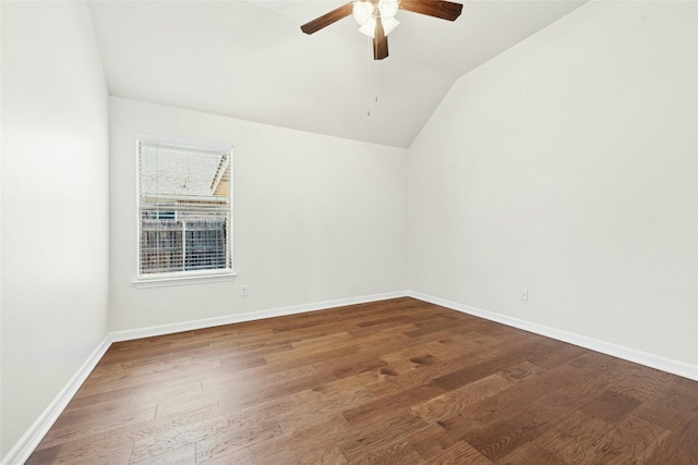 20700 Windmill Ridge St, Pflugerville, TX 78660 - empty room featuring lofted ceiling, wood finished floors, a ceiling fan, and baseboards