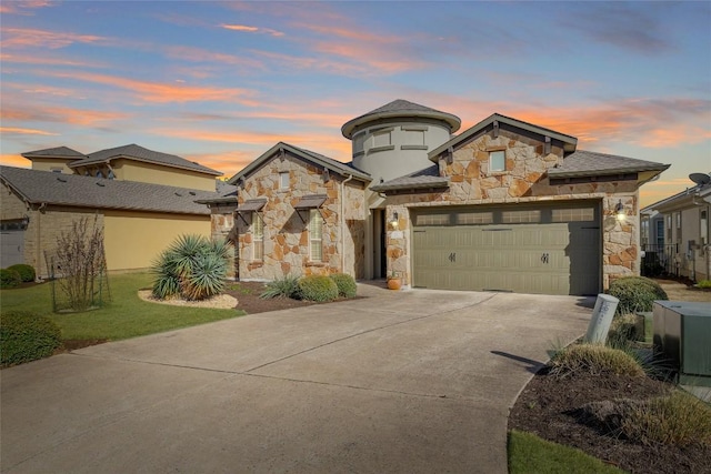 362 Wellington Dr, Austin, TX 78737 - french provincial home featuring concrete driveway, a yard, stone siding, and a garage