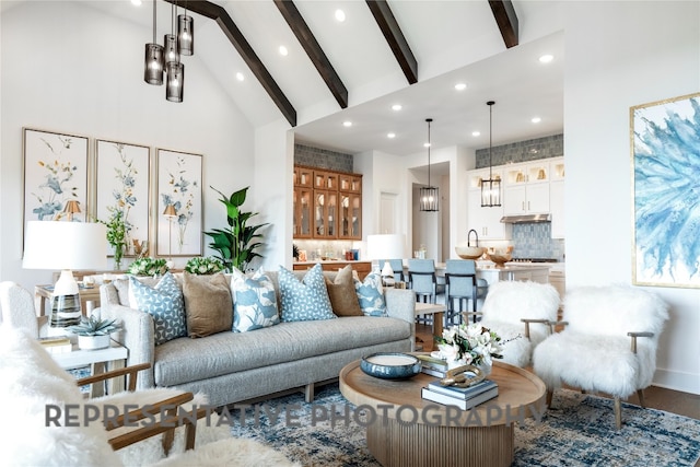 367 Muddy Crk, Kyle, TX 78640 - living room with high vaulted ceiling, recessed lighting, beam ceiling, and wood finished floors