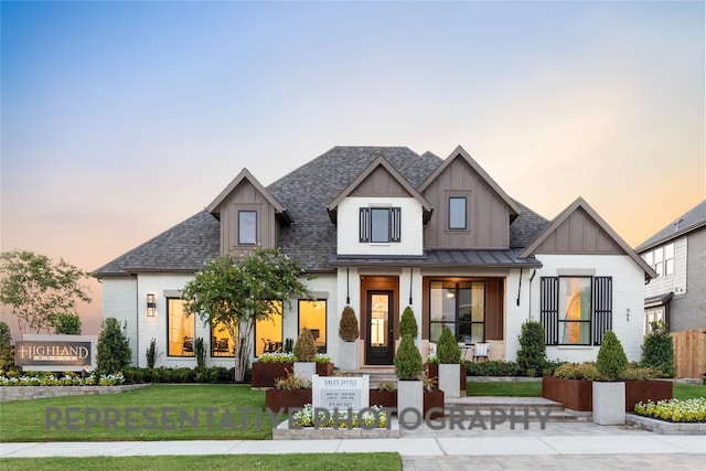 367 Muddy Crk, Kyle, TX 78640 - modern inspired farmhouse with board and batten siding, a lawn, a shingled roof, and covered porch